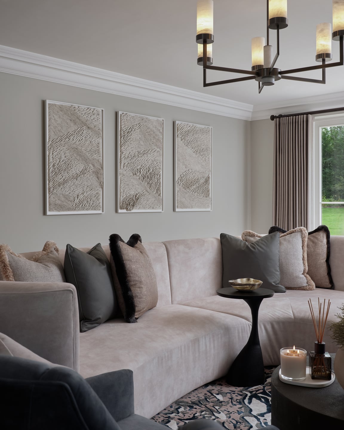 Curved seating layered with tactile cushions