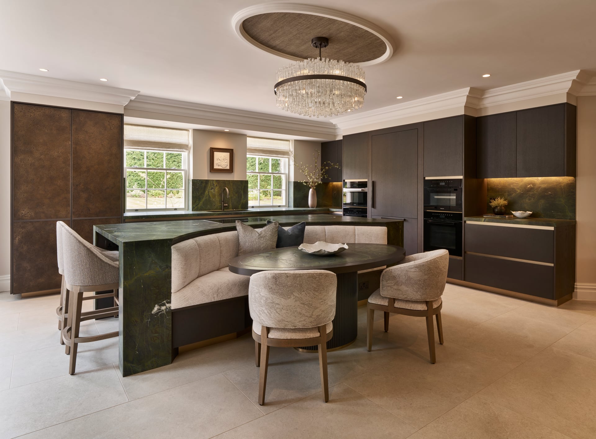 Kitchen in dark stone and warm timber