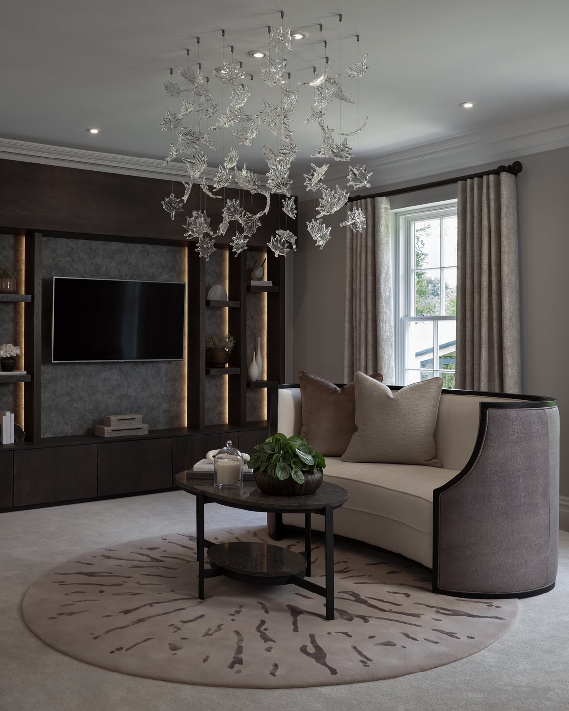 Living room with layered architectural and decorative lighting