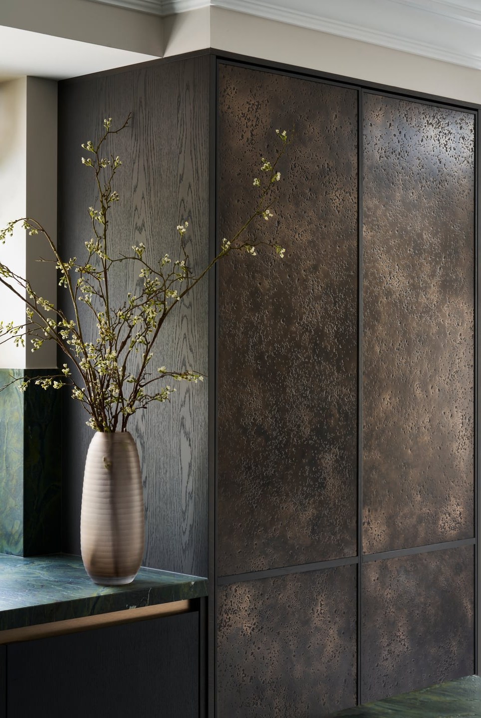 Decorative wall panel in dark bronze tones